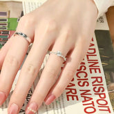 hand wearing lock and key couple rings set